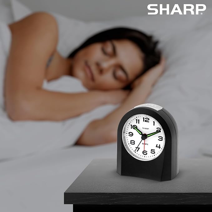 Sharp Battery-Powered Analog Alarm Clock, Silent Sweep, Snooze and Light | Silent no-tick movement; Ascending beep alarm; Gentle wake; Snooze; On-demand light; Compact size; Battery operated; Black