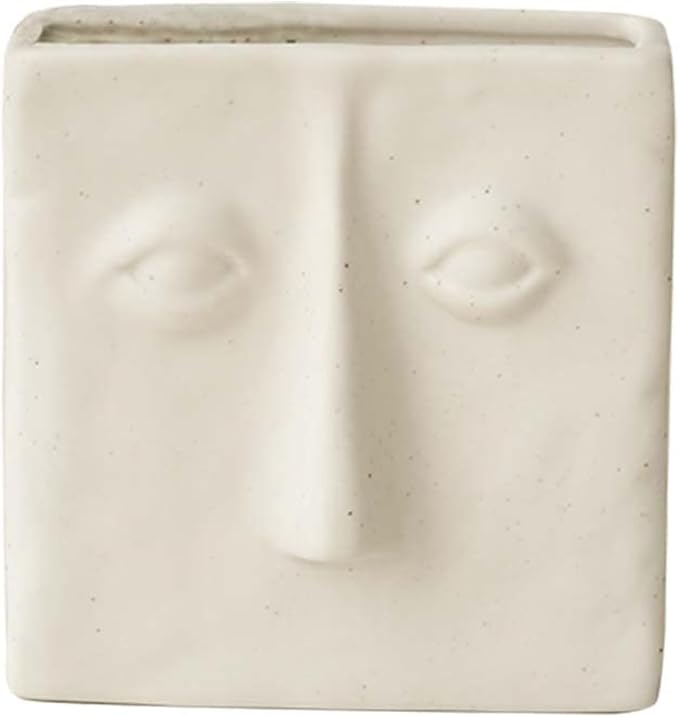 WENSHUO Ceramic Pen Holder, Pencil Holder for Desk, Desk Accessories, Crème | 3.7 in tall ceramic holder for pens, pencils, makeup brushes, or toothbrushes. Abstract face design displays small plants.