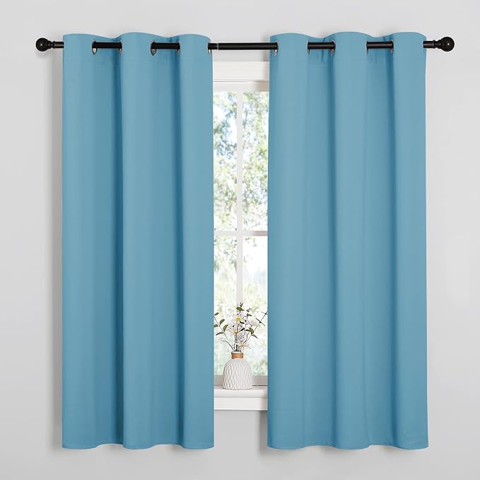 NICETOWN Blackout Draperies Curtains for Kids Room, Window Treatment Thermal Insulated Grommet Blackout Drape Panels for Bedroom (Teal Blue, Set of 2, 34 by 54 inches)