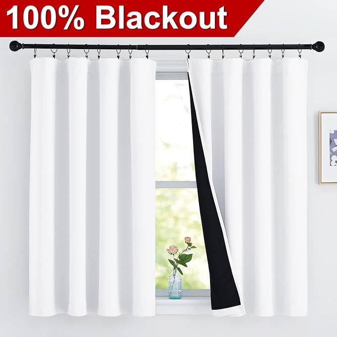NICETOWN 100% Blackout Curtains 54 inches Long, Double-Deck Completely Blackout Window Treatment Thermal Insulated Lined Rod Pocket Drapes for Infant (White, 1 Pair, 52 inches Width Each Panel)