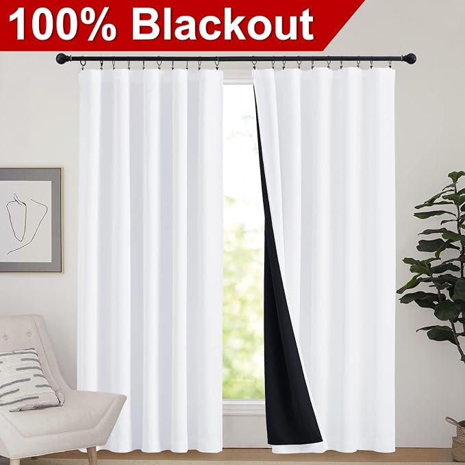 NICETOWN 100% Blackout Curtain Panels, Rod Pocket Window Curtains with Black Liner for Nursery, 84 inches Drop Cold and Full Light Blocking Draperies (White, 2 Pieces, 62 inches Wide Each Panel)