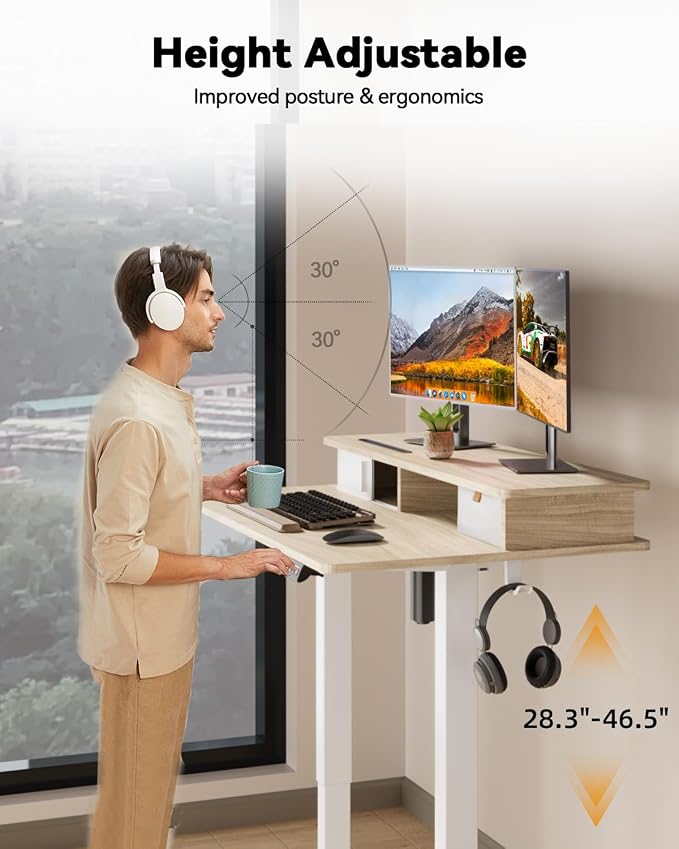 JOY worker 35" Small Electric Standing Desk with Monitor Stand & Drawer | Light Walnut 35" x 25" Height Adjustable Desk for Tight Space, Shutter Door & Shelf, Sit Stand Desk with 2 Hooks, Home Office