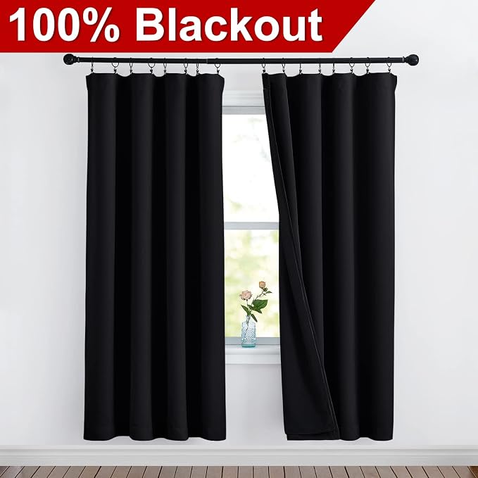 NICETOWN Cold Reducing Curtains, 100% Blackout Curtains 52 x 72, Full Light Blocking Drapes with Black Liner for Nursery, Thermal Bedroom Drapes and Curtains (Black, 2 Pieces)
