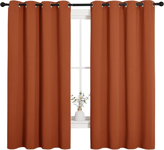NICETOWN Blackout Curtain Panels for Girls Room, Nursery Essential Thermal Insulated Solid Grommet Top Blackout Drapes (Burnt Orange, 1 Pair, 55 x 68 inches)