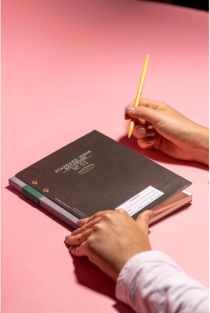 DesignWorks Ink Standard Issue Notebook No. 3, Undated Daily Planner & Writing Journal, 192 Lined Pages, Pen Holder, Small Notebook for Work & Journaling, 6.75 x 8.5 in, Black