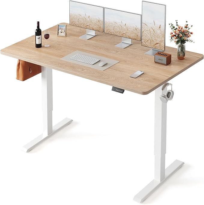 FEZIBO Standing Desk, 63×28 Inches Electric Height Adjustable, Sit Stand Up Table, Computer Office Desk with Splice Board, While Frame/Maple TOP