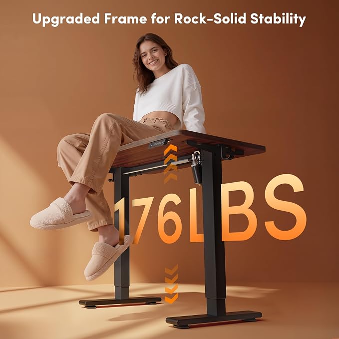 FEZIBO Small Standing Desk, 32 × 19 Inches Electric Height Adjustable, Sit and Stand Up, Computer Office Desk with Splice Board, Black Frame/Black Walnut Top