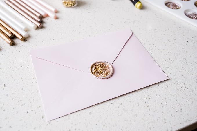Hoppler Premium Wax Seal Kit with Seal Gun, Wax Sticks, a Flower Stamp, 12 Cavity Silicone Mold, and Extra Additions to Make Seals Stand Out and Make Invitations in Bulk. (Champane Gold)