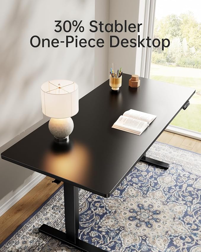 HUANUO Electric Standing Desk, Whole Piece Desktop, Adjustable Height Computer Desk, 4 Height Memory Settings, Sit Stand Up Desk for Home Office, 55" x 27", Black