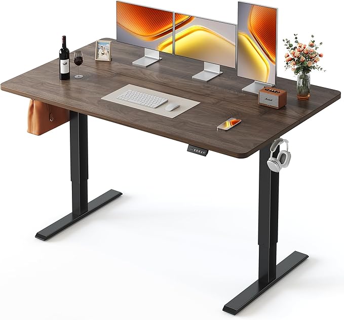 FEZIBO Standing Desk, 55×28 Inches Electric Height Adjustable, Sit Stand Up, Computer Office Desk with Splice Board, Black Frame/Black Walnut TOP