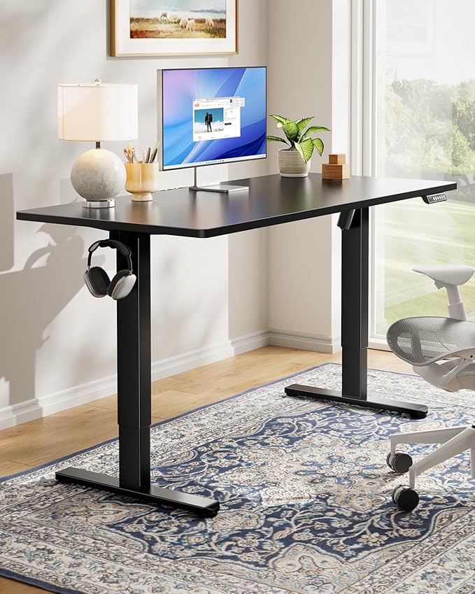 HUANUO Electric Standing Desk, Whole Piece Desktop, Adjustable Height Computer Desk, 4 Height Memory Settings, Sit Stand Up Desk for Home Office, 40" x 24", Black