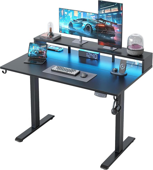 Klicelor Electric Standing Desk with Shelf, 48 Inch Height Adjustable Desk with Power Outlets & LED, Sit Stand Up Table with Monitor Stand, Computer Workstation for Home Office, Black