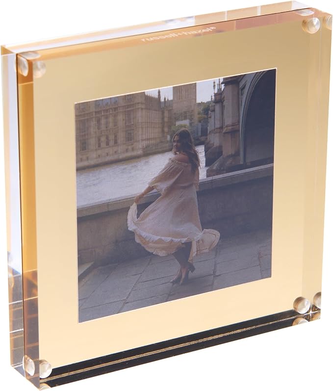 russell+hazel Acrylic & Gold Picture Frame, Clear, 4"x4" | Displays a favorite 4"x4" photo with modern flair. Clear acrylic with gold-toned accents suits any desk or shelf.