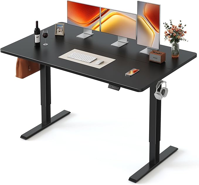 FEZIBO Standing Desk, 63×28 Inches Electric Height Adjustable, Sit Stand Up, Computer Office Desk with Splice Board, Black Frame/Black TOP