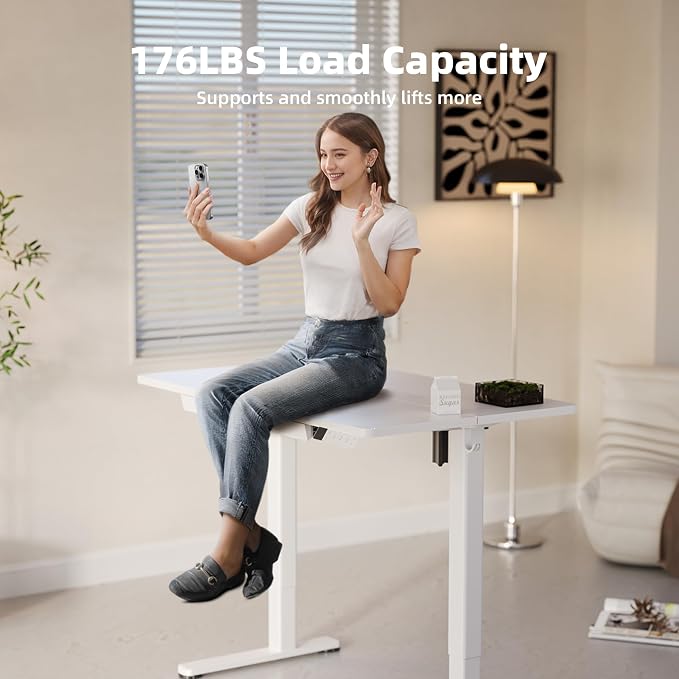 YDN Electric Standing Desk 48 x 24 Inch with Drawer White | Industrial steel frame supports 176 lbs, 28.3 to 46.5 inch height range, quiet 45 dB motor, 25.6 x 12.6 inch storage drawer