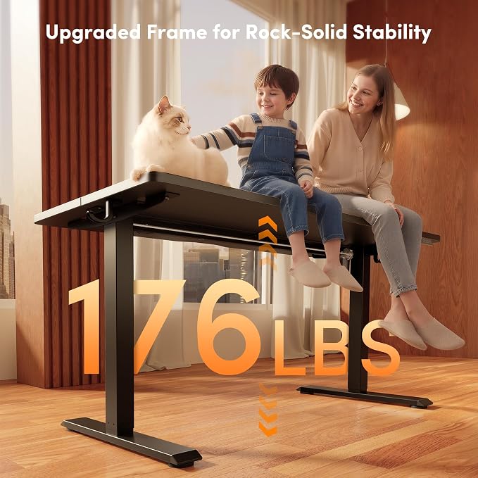 FEZIBO 55 x 24 Inchs Electric Standing Desk, Height Adjustable, Sit Stand Up, Computer Office Desk with Splice Board, Black Frame/Black Top