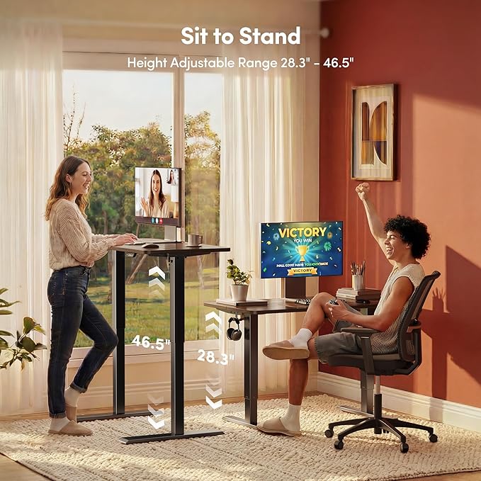 FEZIBO Small Standing Desk, 32 × 19 Inches Electric Height Adjustable, Sit and Stand Up, Computer Office Desk with Splice Board, Black Frame/Black Walnut Top