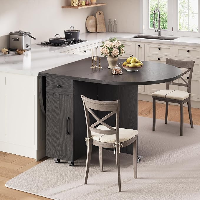 Jocoevol Round Folding Dining Table for 4, Space Saving Drop Leaf Kitchen Table with Storage Drawer, 6 Wheels Oval Gateleg Foldable Dining Table for Small Spaces(Black 47 * 23.6 * 30)